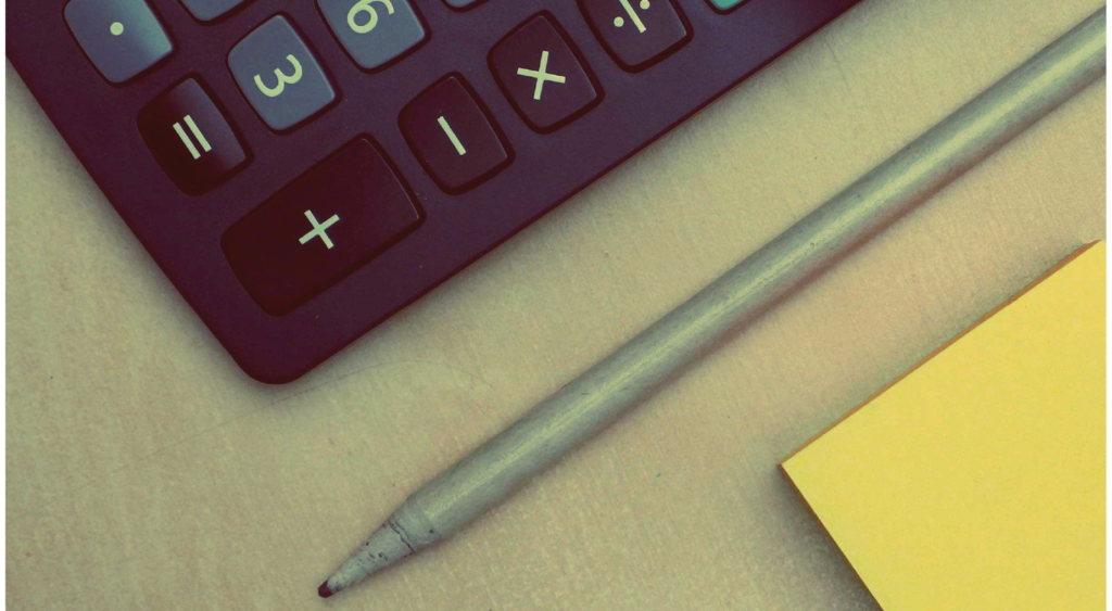 on-demand IQ - ebook on gig economy - calculator pen post-it notes
