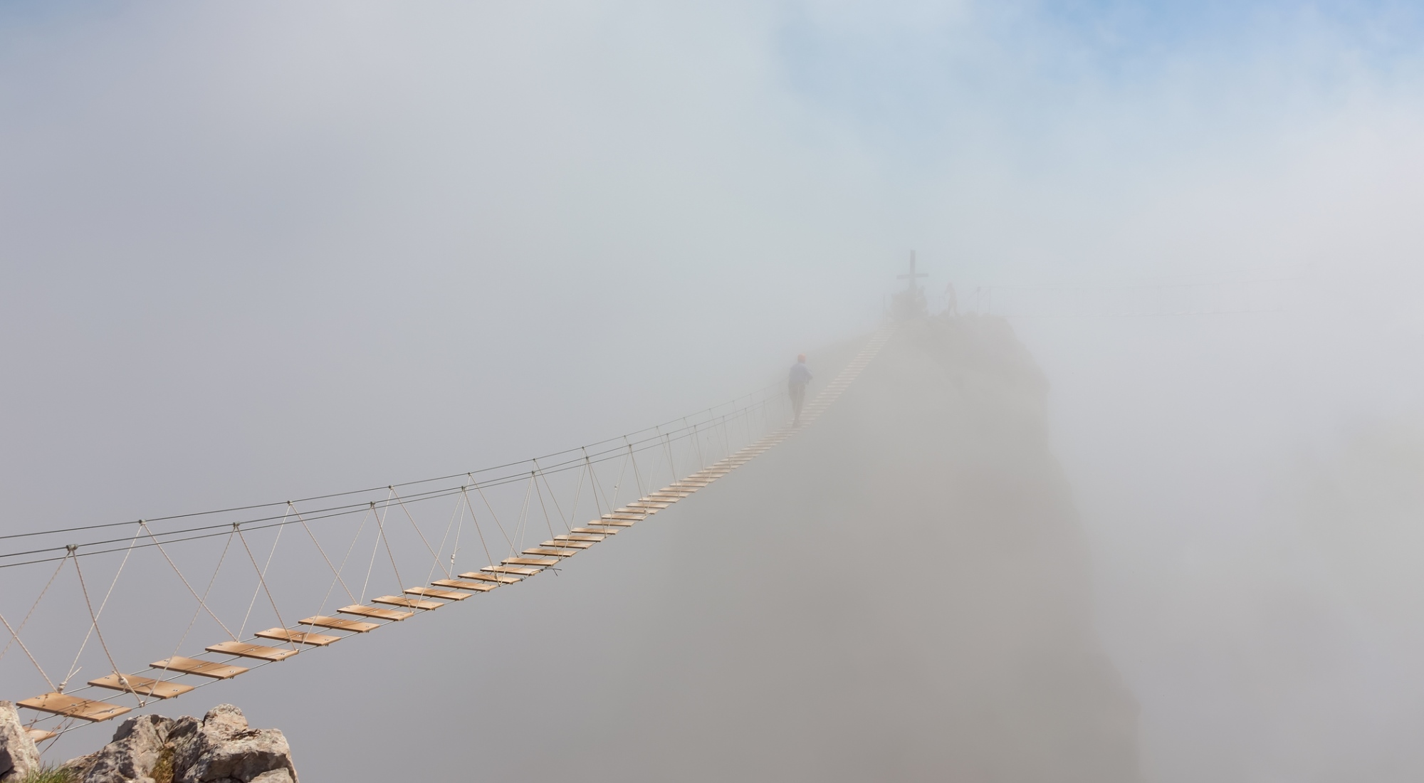 what is the human cloud: wooden suspension bridge in the clouds